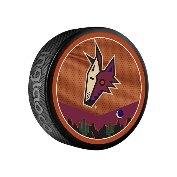 Coyotes 2022-23 Special Edition Inglasco Puck In Orange, Maroon & Black - Side View 1